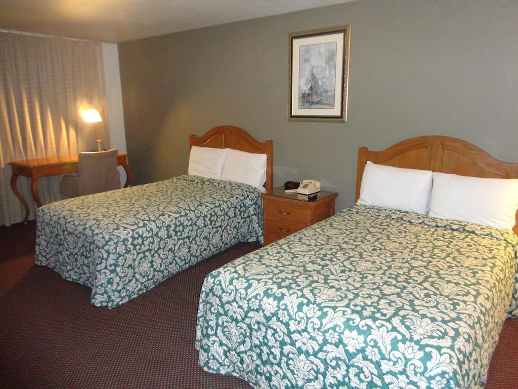 Garden Inn And Suites Silsbee Δωμάτιο φωτογραφία